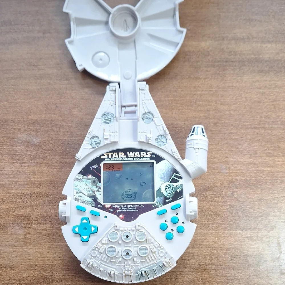 Star Wars Millennium Falcon Handheld Game - White